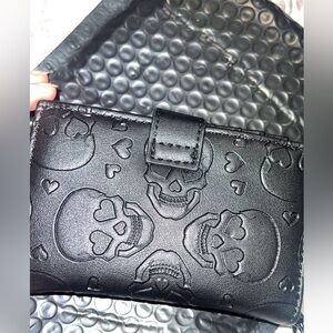 Betsey Johnson Black Skull Embossed Clutch